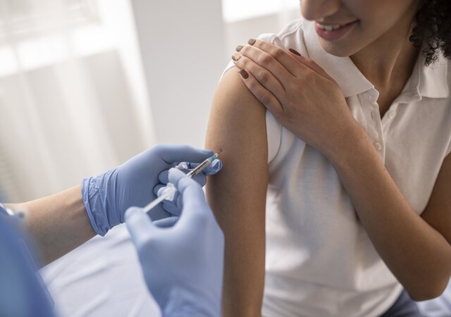 doctor_vaccinating_a_patient_in_a_clinic